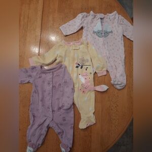 Newborn baby girl footed sleepers. D25